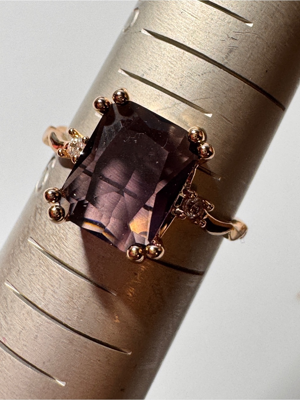 Gold Ring with Purple Rectangular Gem